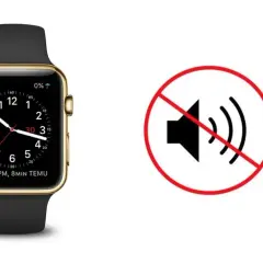Złoty smartwatch obok symbolu wyciszenia. Dowiedz się, jak wyłączyć dźwięk w smartwatch, aby cieszyć się ciszą.
