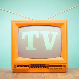 Pomarańczowy telewizor z wysuwanymi antenkami, na ekranie litery "TV".