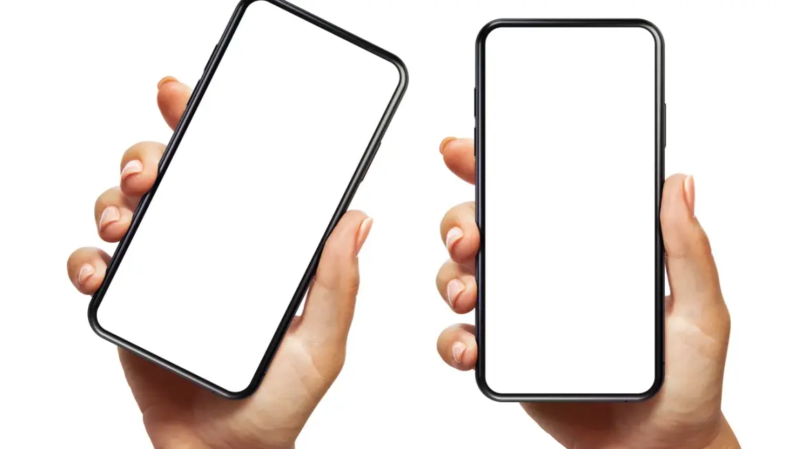 Dwie dłonie trzymające telefony Samsung. Dowiedz się, jak ustawić zdjęcie kontaktu Samsung, aby personalizować rozmowy.