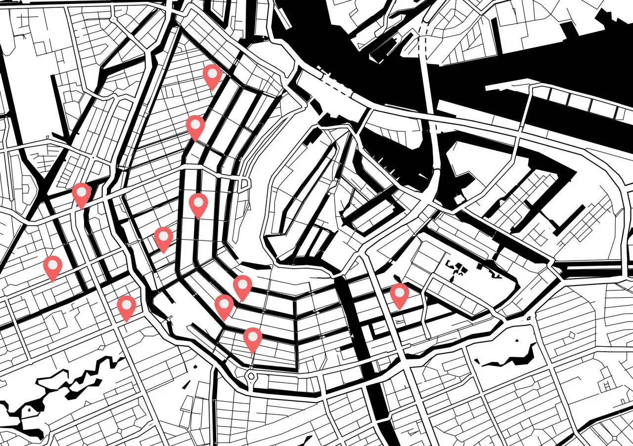 Mapa Amsterdamu z zaznaczonymi punktami. Dowiedz się, jak wysłać pinezkę, by podzielić się lokalizacją.
